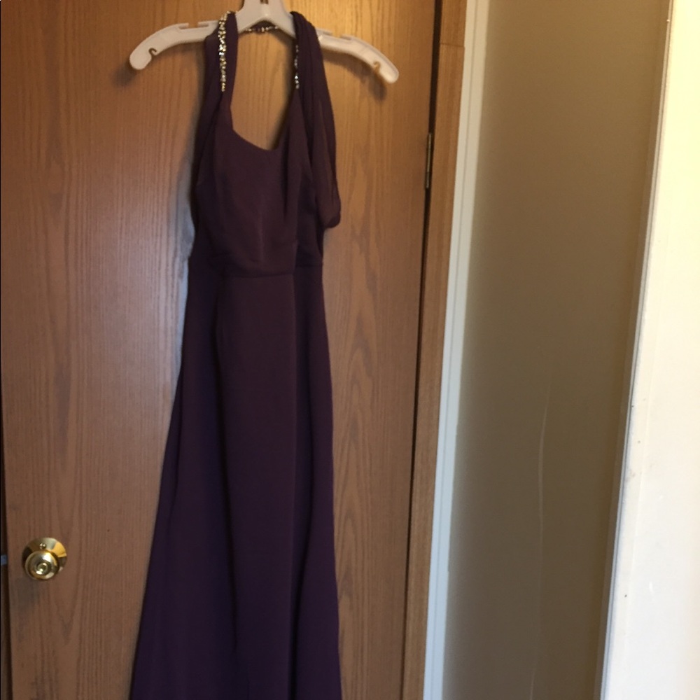 Size 6 David’s bridal gown , new with tags .